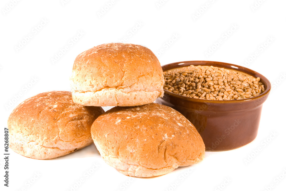 Three Bread Rolls and Bowl of Wheat Grains