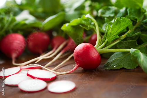 Radishes on a brown surface