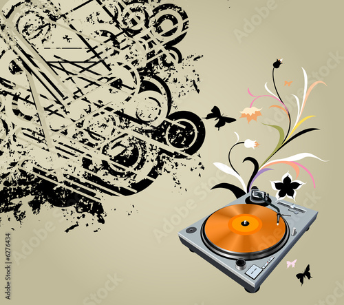 turntable on floral grunge ...