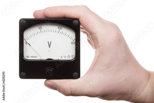 hand holds a voltmeter. Isolated on white [with clipping path].