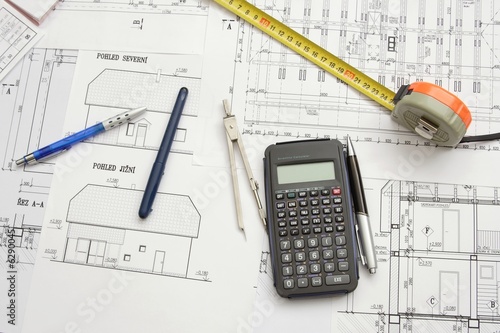 Plans of one family house, writing materials and scale