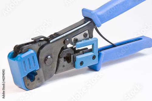 Closeup of crimping tool for RJ-45 and RJ-11 cable jacks