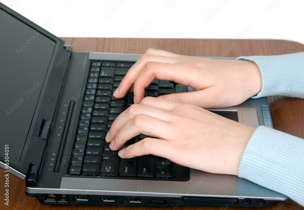 The women is writing some information with notebook