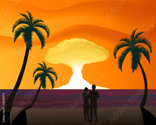 couple on the beach watching a romantic sunset
