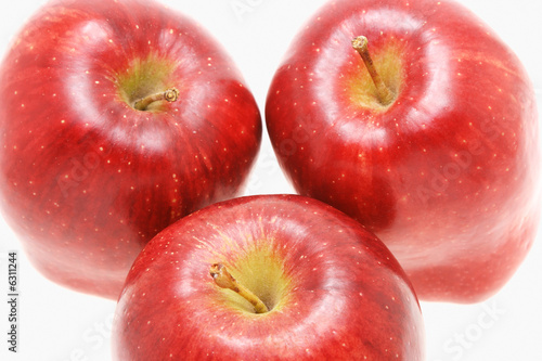 Top view of three fresh red apples