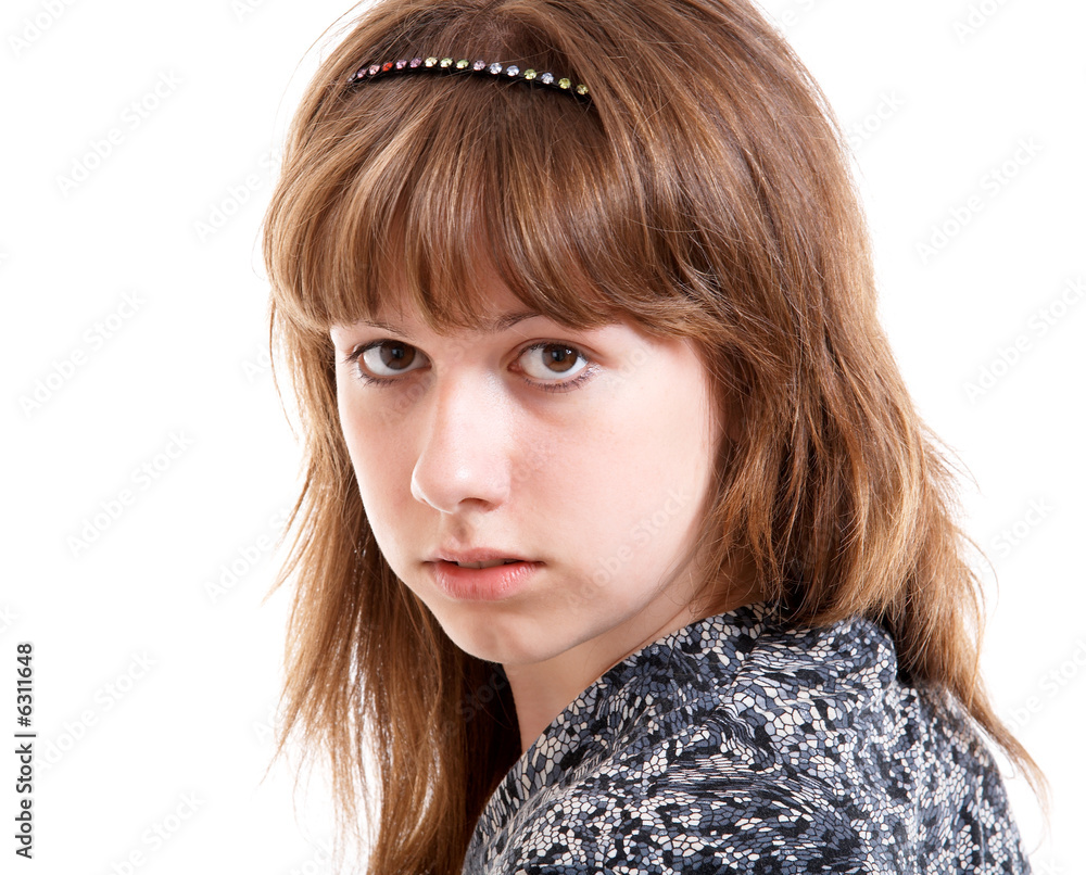 Young girl in summer clothes isolated at the white background