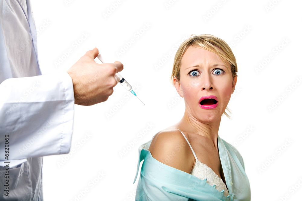 healthcare and medicine: young woman scared of injections healthcare and medicine: young woman scared of injections