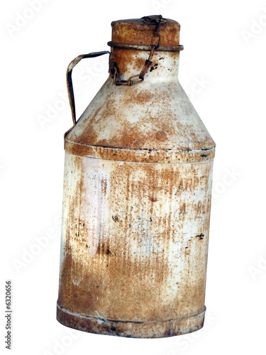 Antique milk jug isolated on white