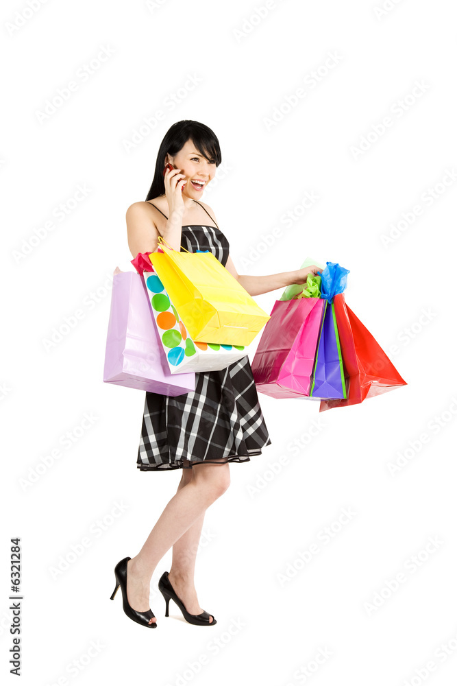 A beautiful woman carrying shopping bags