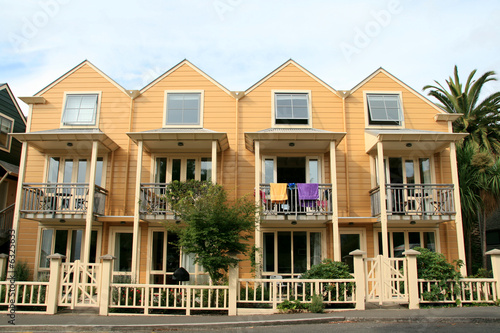 A row of simple wooden holiday homes