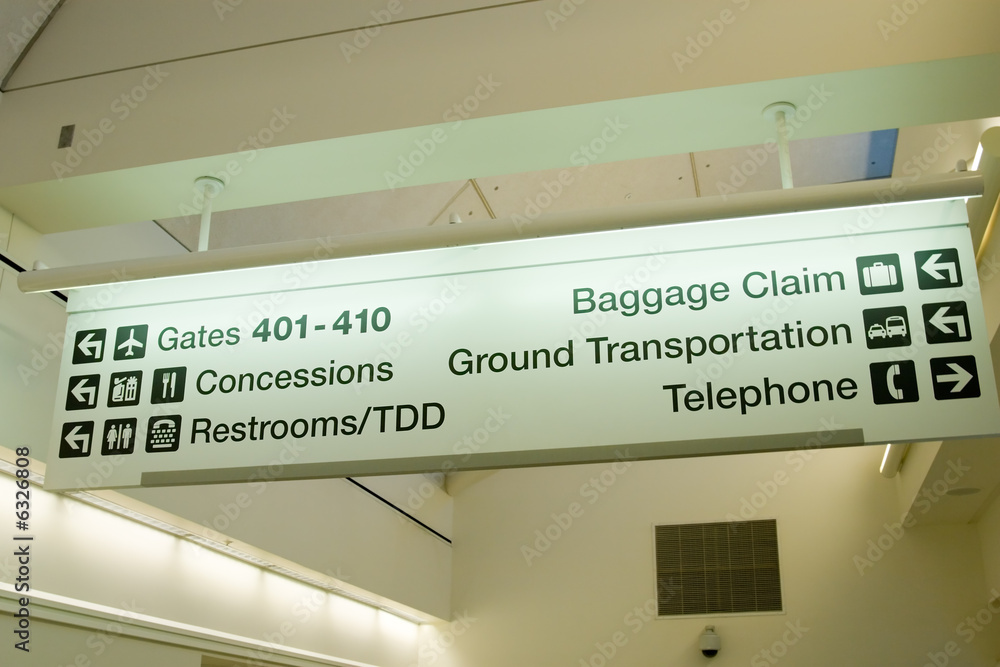 Direction signs in an airport terminal for travelers Stock Photo ...