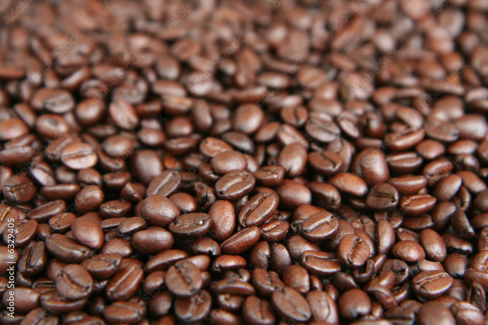 A mixture of coffee beans used as a background