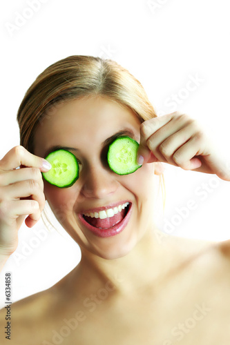 beauty portrait with green cucumber