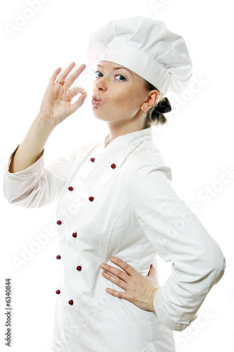 Happy attractive cook woman over white background