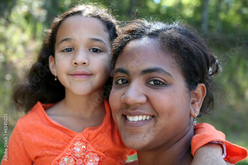 A mixed race mother and daughter