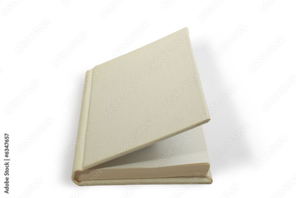 Open light-gray book in hardcover lying on white background Open light-gray book in hardcover lying on white background