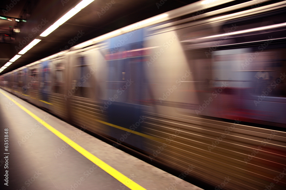 An abstract subway train blured in motion