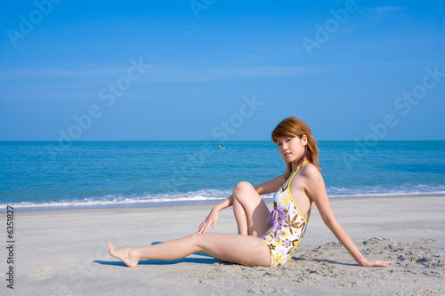 woman having fun by the beach © eyedear