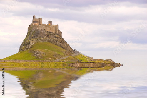 Lindisfarne Castle in Holy Island harbour