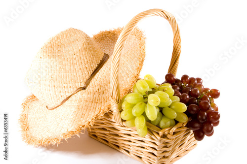 Straw Hat and Cane Basket of Grapes