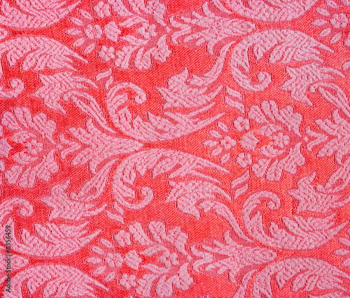 Vintage red textile useful for background.