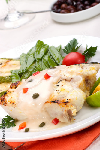 Grilled halibut with capers and pepper sauce