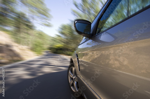 Obraz na plátně side of a car with speed blur