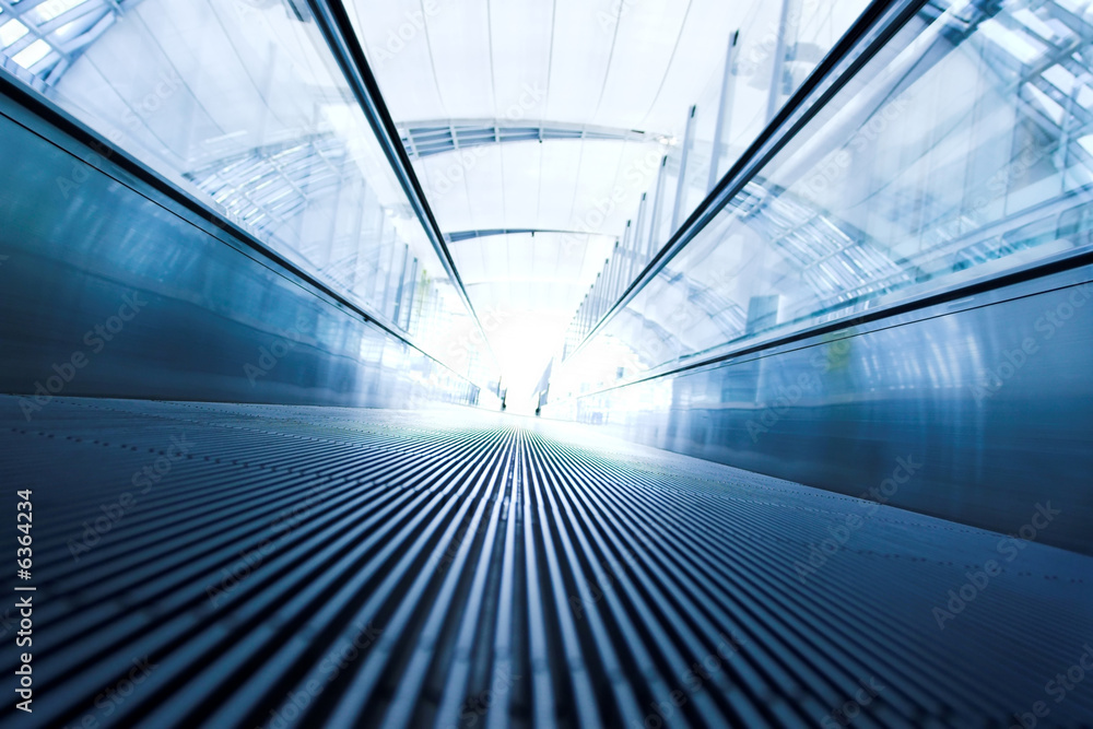 moving escalator in the office hall perspective view moving escalator in the office hall perspective view