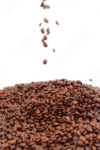 Toasted Coffee beans on white background .