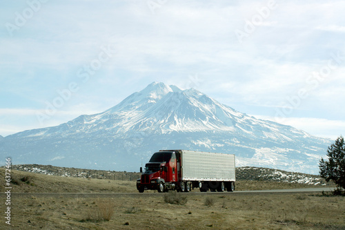Semi truck going fast on interstate highway 