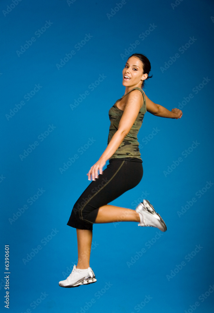 Woman in fitness outfit exercising