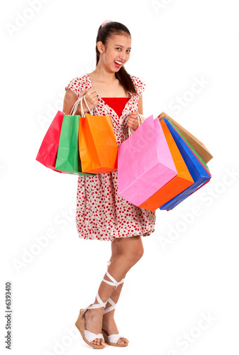 teenager holding shopping bag