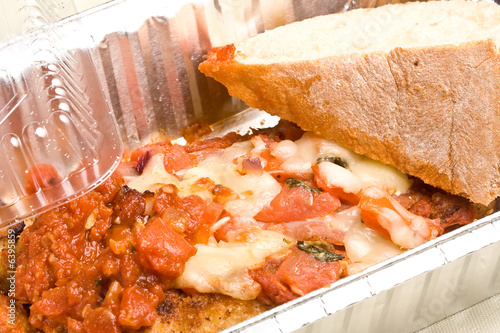 Slika na platnu carry out meal chicken parmesan with a slice of bread