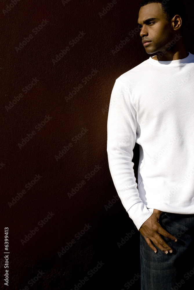 Attractive young African American male playing posing.