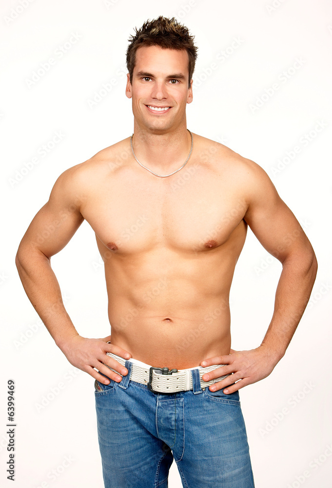 Smiling young strong man. Isolated over white background. Smiling young strong man. Isolated over white background.