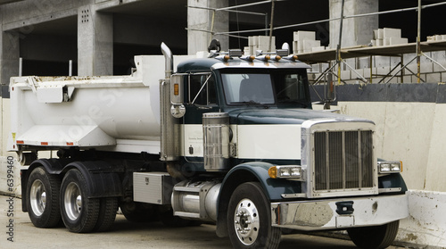 Dump Truck at Garage Construction Site