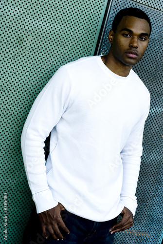 Attractive young African American male playing posing.