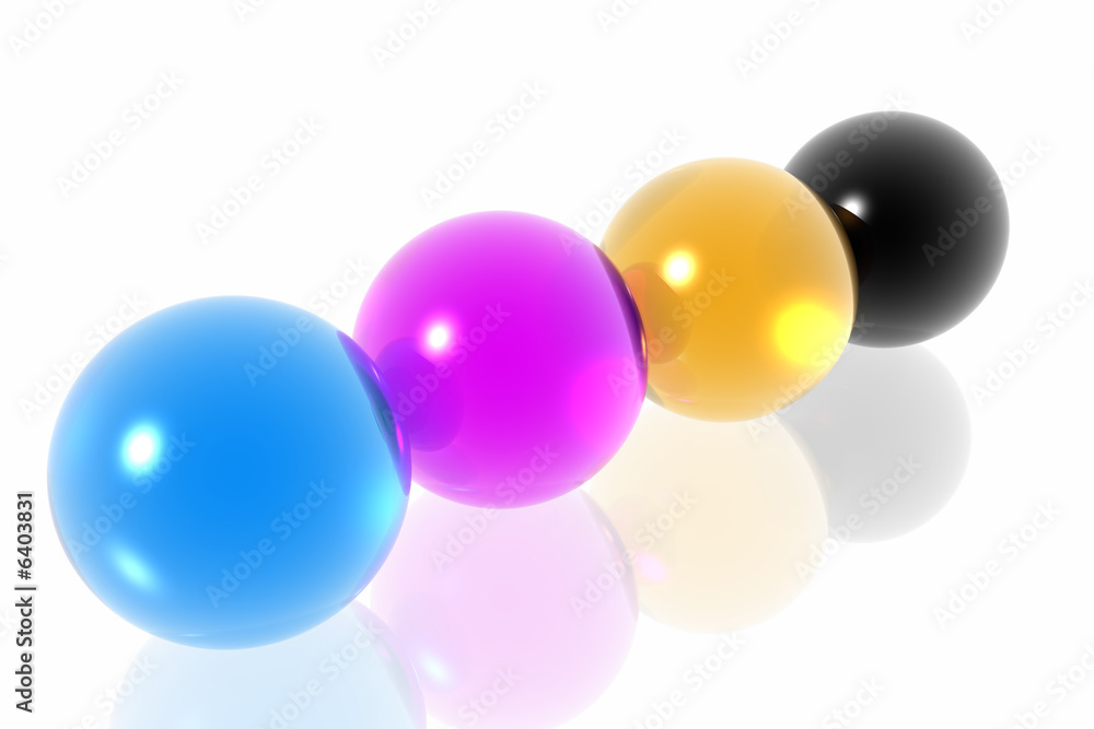 CMYK spheres isolated in white background