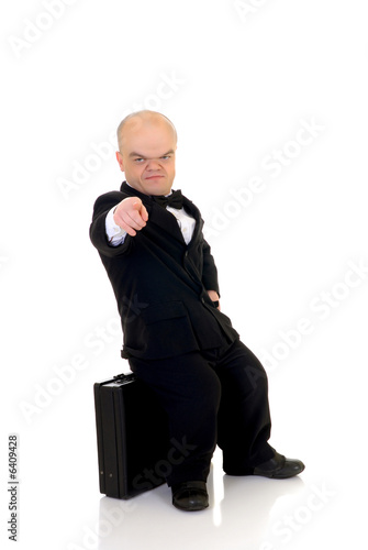 Little businessman, dwarf in a formal suit with bow photo