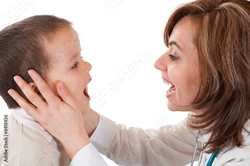Playful examination - boy and doctor closeup - isolated