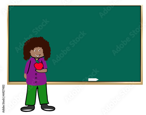ethnic teacher holding apple standing in front of chalkboard 