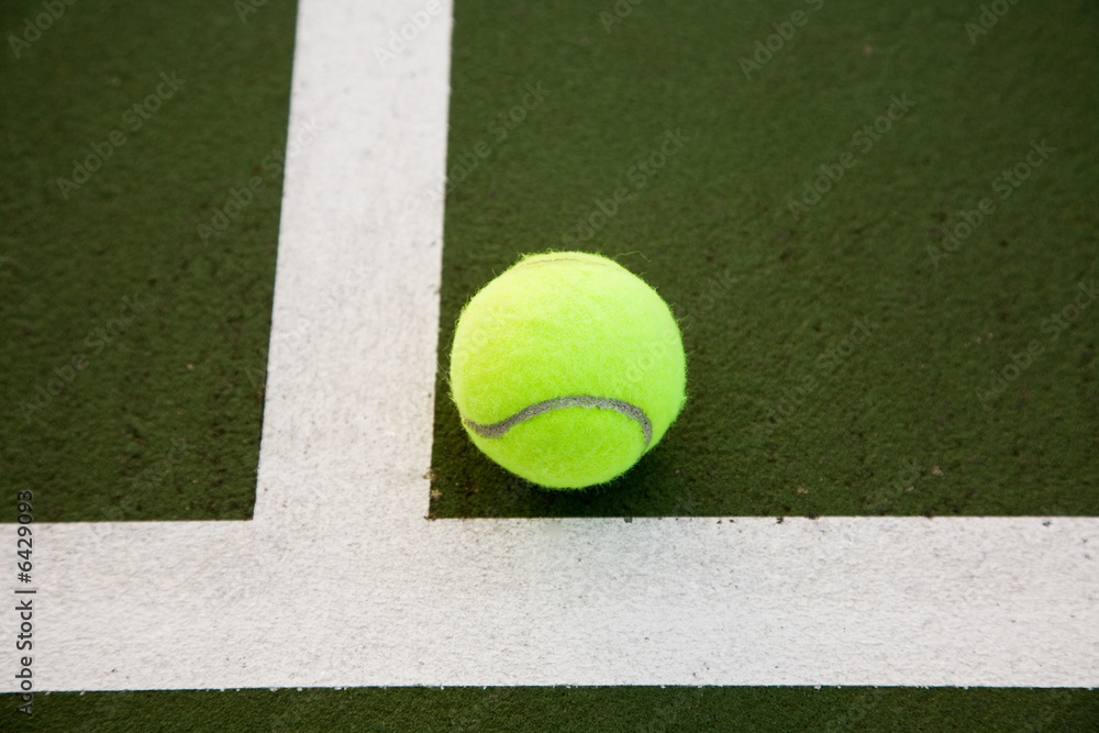 A shot of a tennis ball in a tennis court