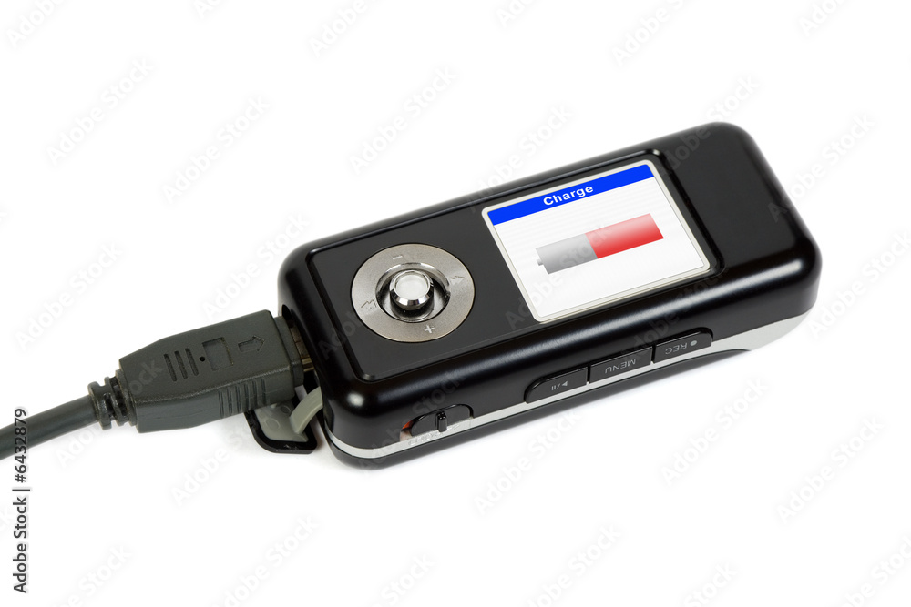 Charging mp3 player, isolated on white background Charging mp3 player, isolated on white background
