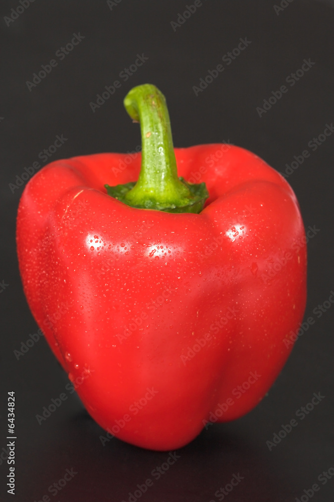 Red pepper on a black background Red pepper on a black background