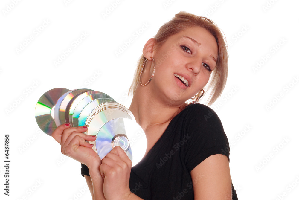 Young blondie woman holding group of rewitable disk media Young blondie woman holding group of rewitable disk media