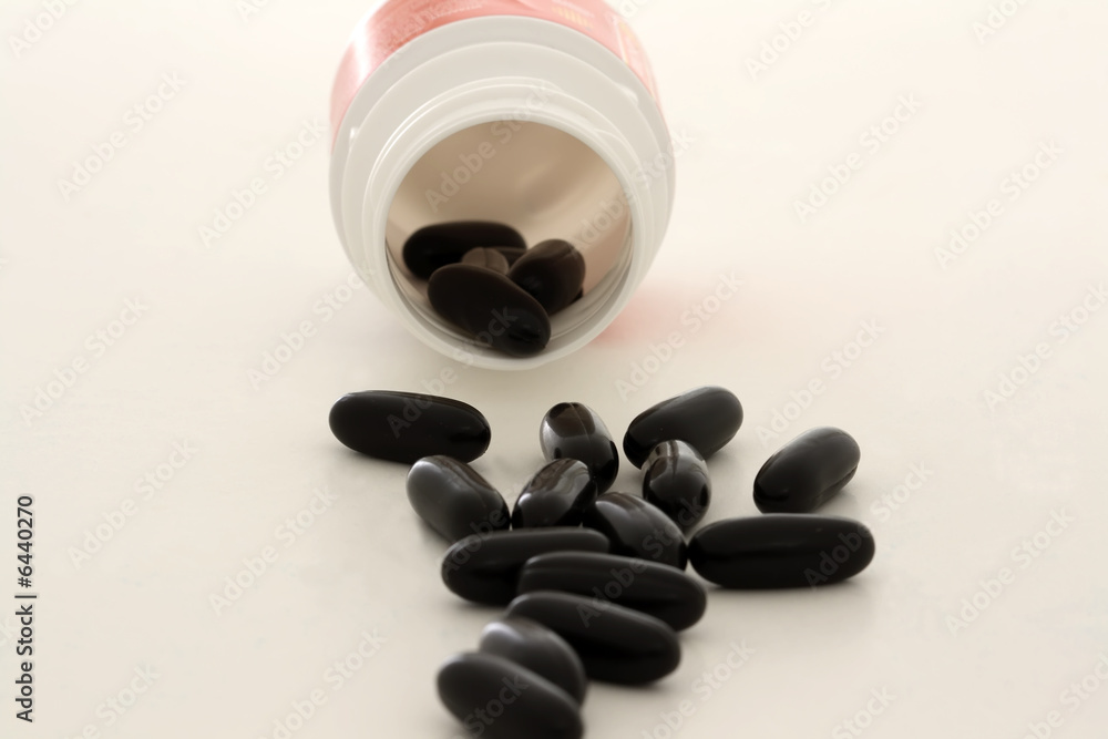 Black vitamin pills Stock Photo Adobe Stock