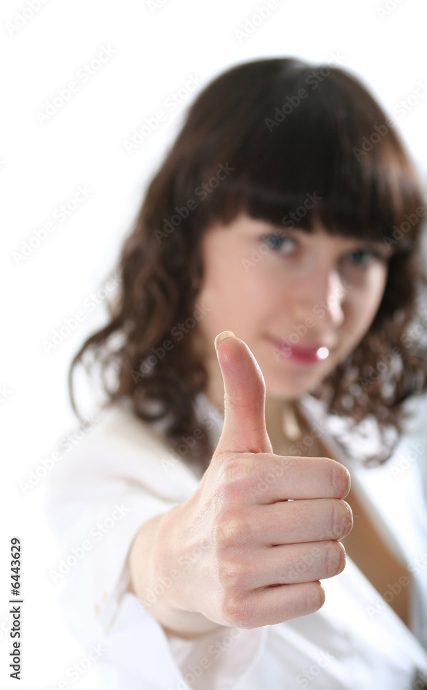 The beautiful young woman with gesture of success The beautiful young woman with gesture of success