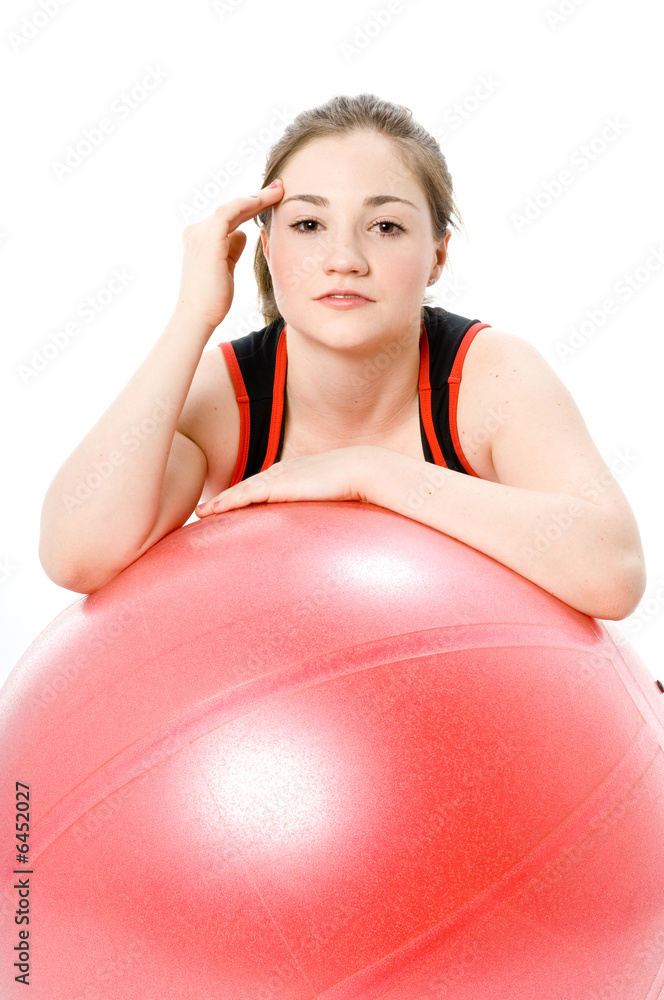 A young caucasian girl doing different stretches