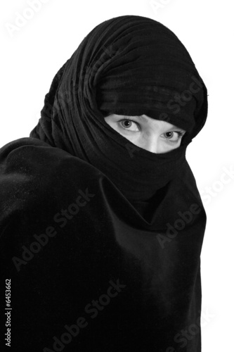 glance of woman in black shawl, isolated on white