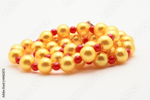 Yellow beads on white